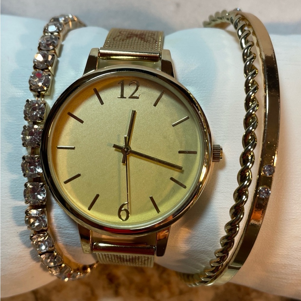 Gold tone Watch with 3 matching bracelets